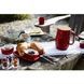 Set of 4 individual baking dishes with a red Staub stand. Staub40511-119-0 photo 2